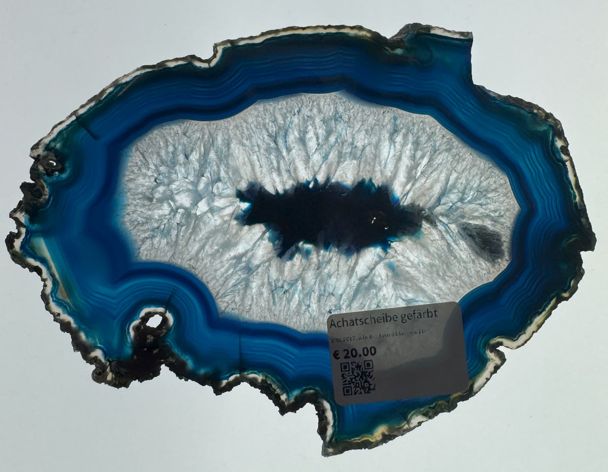 Achatscheibe bunt gefärbt in leuchtendem Blau – natürliche Mineralscheibe mit charakteristischer Bänderung