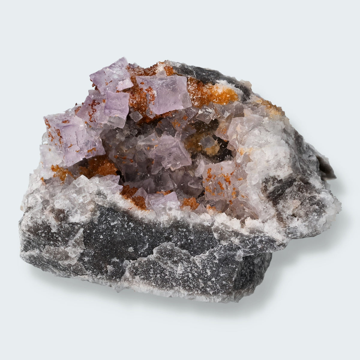 Violetter Fluorit aus Mexiko mit weissen und gelben Quarz Anlagerungen (56g)
